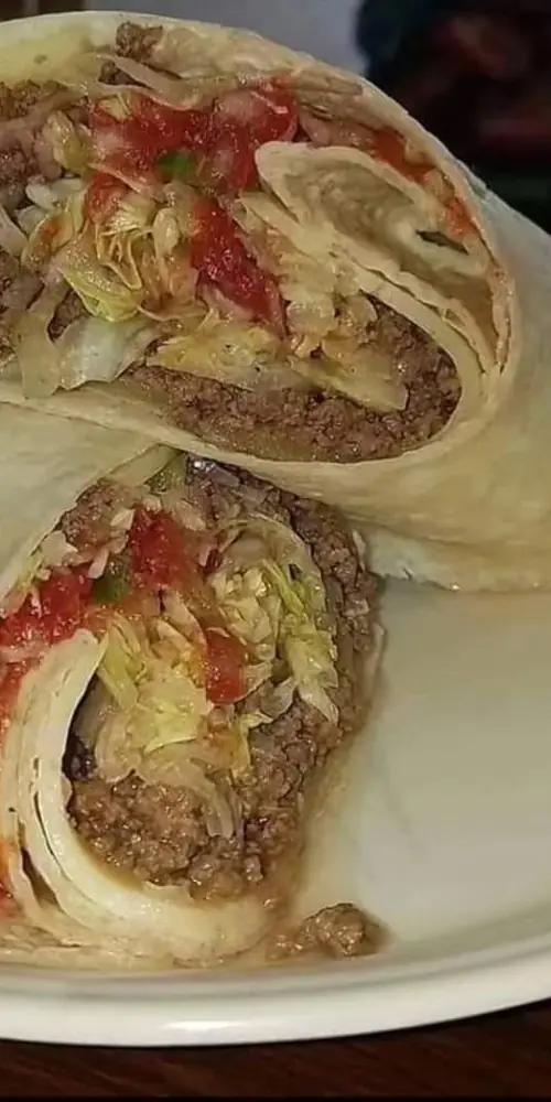 Friday's special is a Taco wrap. Seasoned beef, swisserella, lettuce, onion, salsa and sour cream i