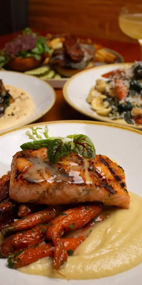 Atlantic Salmon; parsnip purée, roasted Jericho Settlers Farm baby carrots, fennel agrodolce, & verj