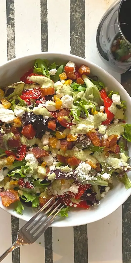 Salad with your pizza? We have 4 to choose from....The Farmer's Salad is shown here. Fresh greens, c