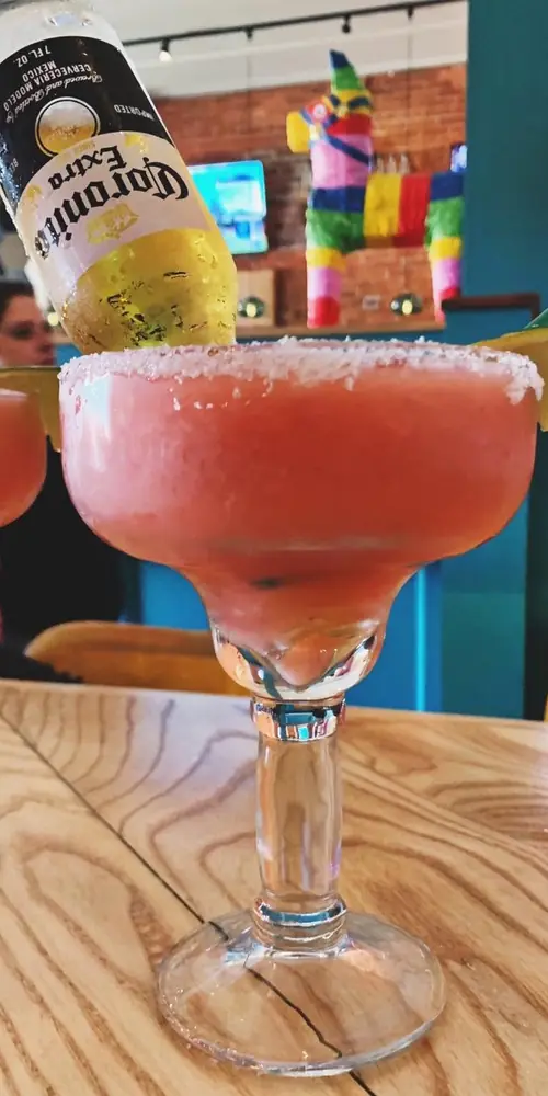 🍹Like Corona AND margaritas? Ask for this secret menu item: a frozen strawberry coronarita!