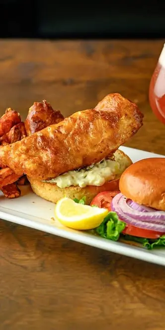 Sink into the weekend with our house-made beer-battered fish sandwich, the Grand Banks, and your fav